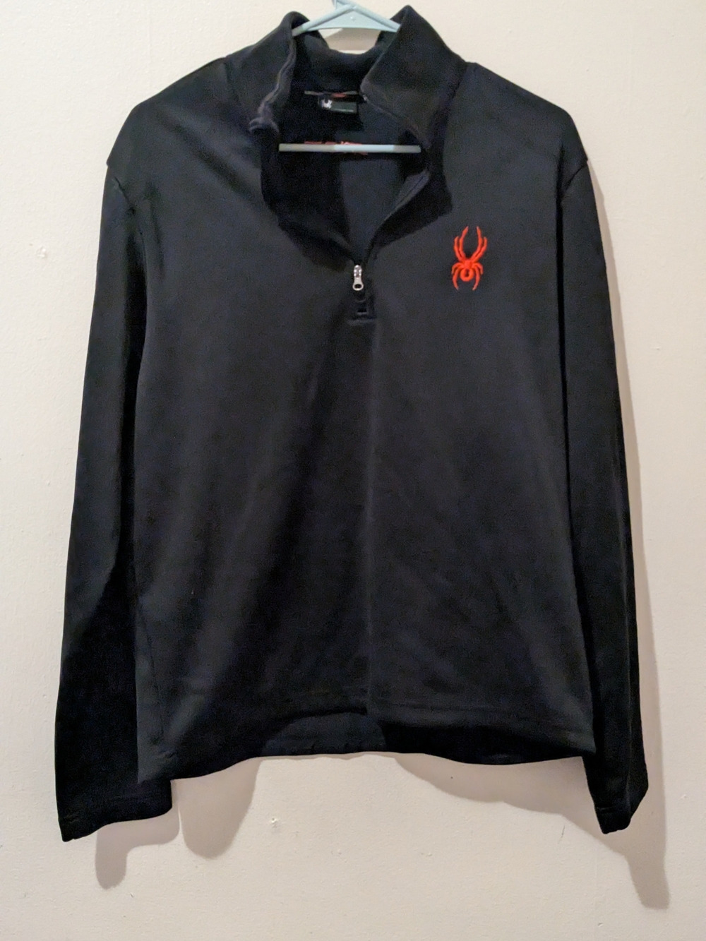 Spyder Black Pullover Tag with Red Accent